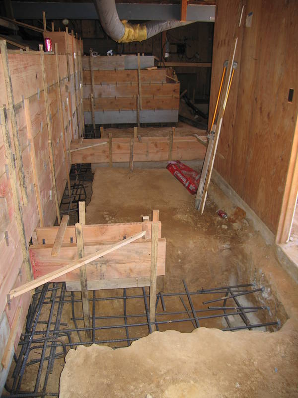 Under the house, the walls of the stair...