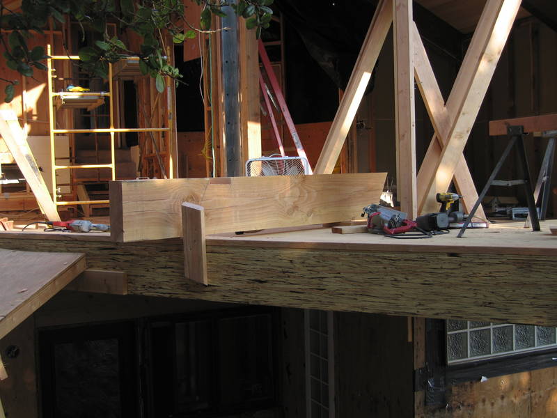 A rafter waits to be trimmed and lifted....