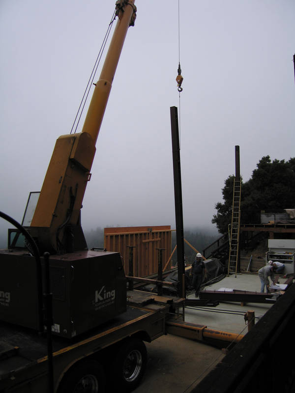 The east vertical is lowered into place....