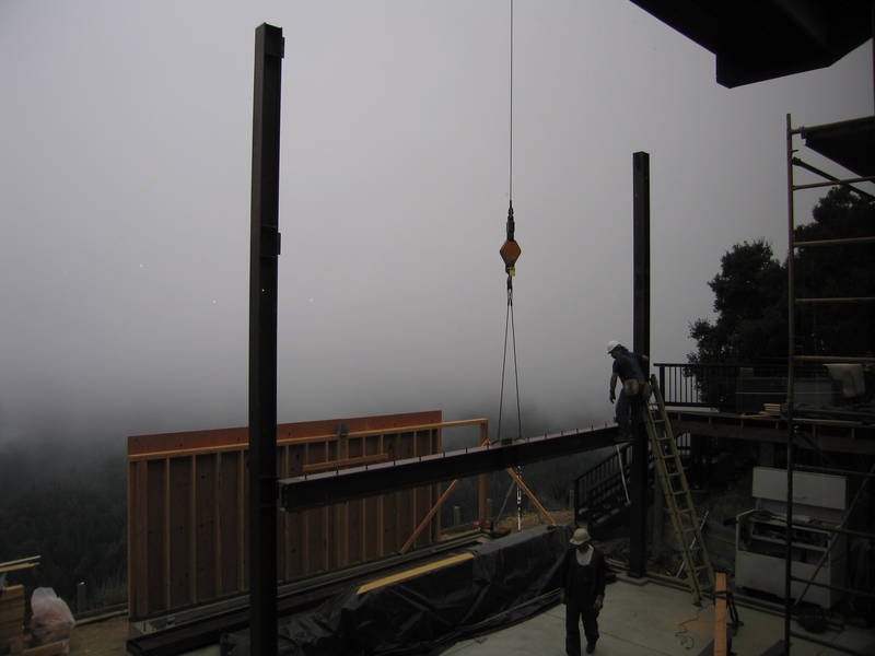 Climb aboard. One iron worker prepares...