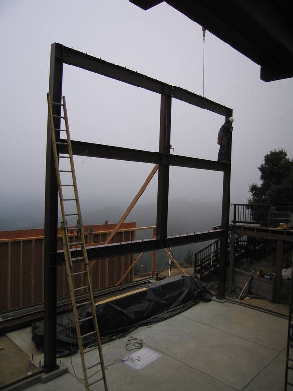 Held in place by the crane, the last...