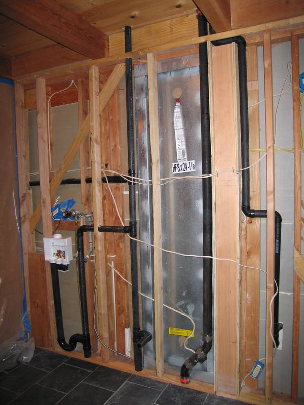 After a bit of tile cutting and...