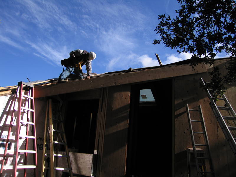 At the back of the house, setting up to...