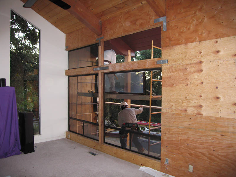 Moving upstairs, the living room windows...