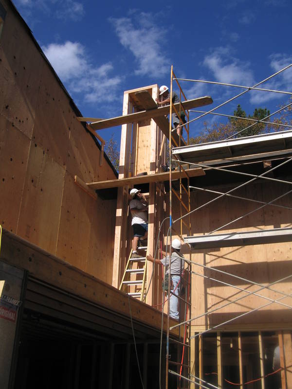 The chimney chase gets framed...