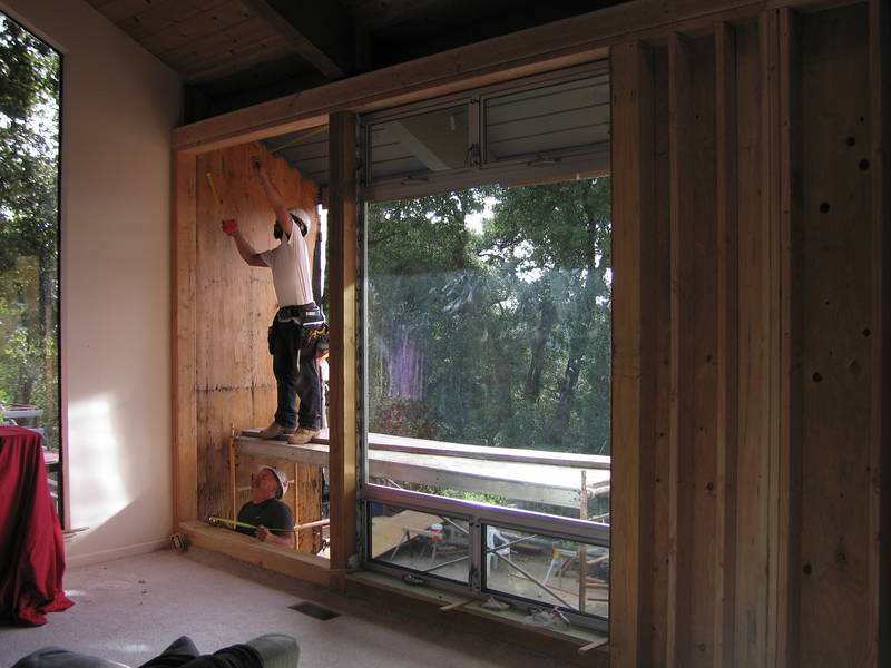 Measuring the living room opening before...