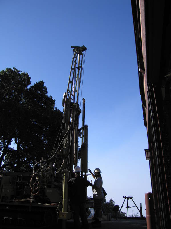 At four foot intervals, they pound a...