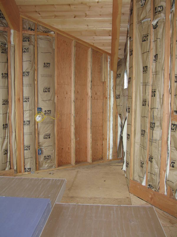 Now that drywall is inside (foreground),...