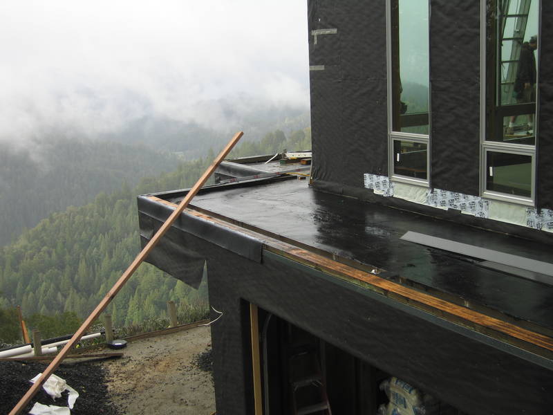 Railings start to go in. First, a curb...