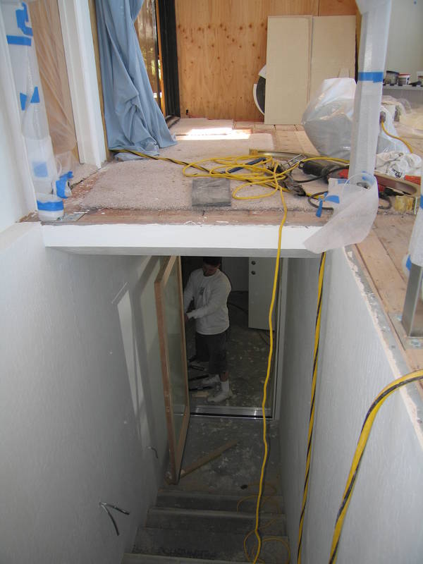 The glass door at the bottom of the...