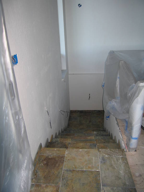 More progress on the stairs. Tiles are...