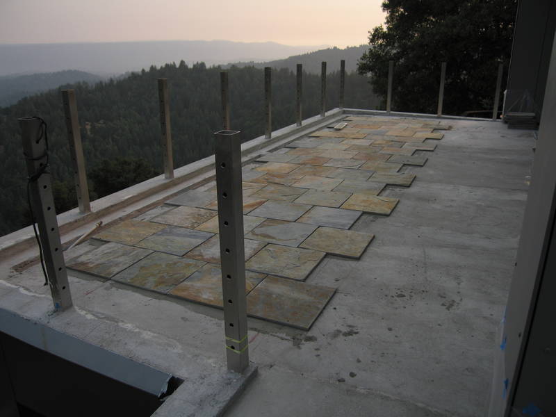 South deck after one day of tiling. Wow!...