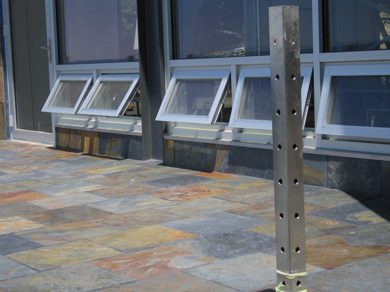 The detail under the windows and into...