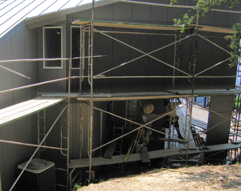 Above, the bathroom windows are framed...