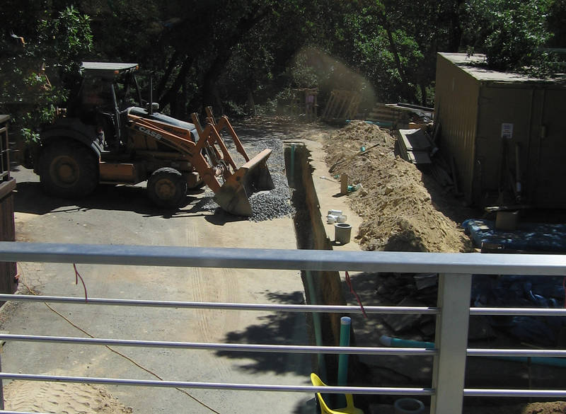 Then the drain pipe is set in place,...