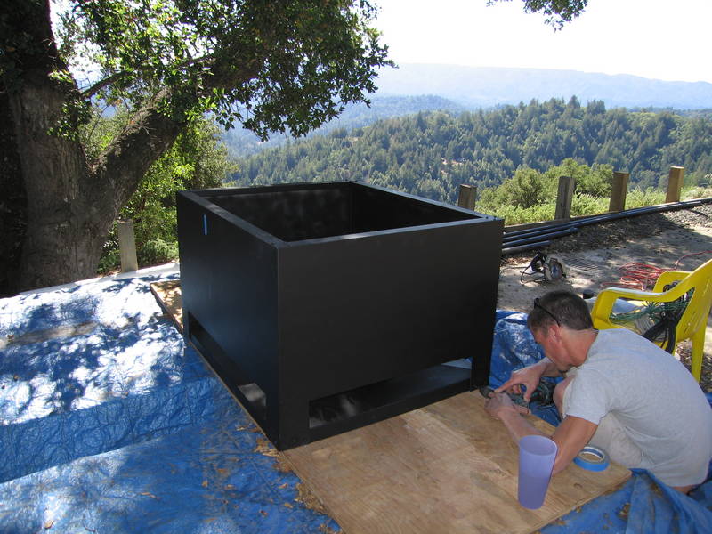 Jeff sizes up the chimney shroud. Wow,...