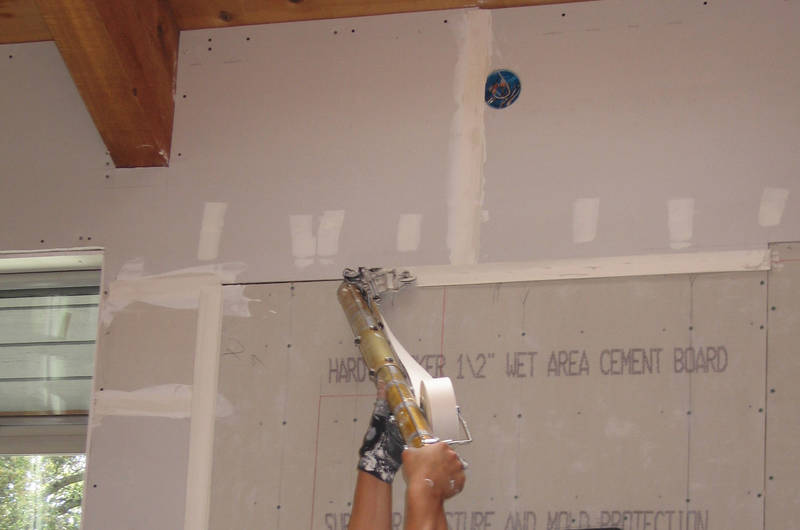 This tool, known as the bazooka, spreads...